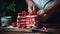 Cook slicing a Strawberry cake into slices