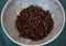 Cooked black beans in silver colander