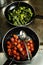 Cooked cherry tomatoes and green peppers