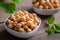 Cooked chick peas in white bowl