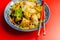 Cooked chicken breast pieces with savory garlic and ginger soy sauce and  noodles, black fungus mushrooms, savoy cabbage, and