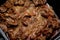 cooked chicken livers, gizzards and hearts, selective focus of fresh liver, gizzard and heart of chickens full of protein in a