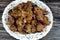 cooked chicken livers, gizzards and hearts, selective focus of fresh liver, gizzard and heart of chickens full of protein in a