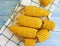 Cooked corn, a plate healthy delicious fresh agriculture ingredient food appetizer on a blue wooden background,
