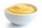 Cooked cornmeal polenta in white ceramic bowl.