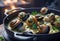 Cooked Escargots De Bourgogne snails with garlic butter and parsley on a plate in a restaurant, delicious and healthy food,