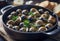 Cooked Escargots De Bourgogne snails with garlic butter and parsley on a plate in a restaurant, delicious and healthy food,