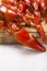 Cooked freshwater crayfish on wooden board