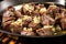 cooked garlic bbq steak tips with melted garlic butter