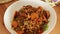 Cooked hot Lentils poured onto plate - closeup