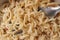 Cooked instant vermicelli in bowl and fork closeup