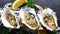 Cooked Oysters in Half Shells on Black Textured Slate Background, Top View