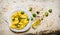 Cooked pasta with Brussels sprouts in a white plate with olive oil.