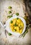 Cooked pasta with Brussels sprouts in a white plate with olive oil.