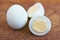 Cooked peeled eggs on the wooden table