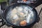 Cooked russian fish soup in cauldron