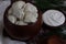 Cooked russian pelmeni meat dumplings in clay pot