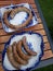 Cooked sausages on ornate plates outdoor