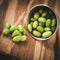 Cooked shelled edamame in stainless steel container