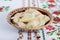 The cooked traditional Ukrainian hand-made vareniki dumpling with cherry