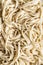 Cooked udon noodles. Traditional Japanese noodles