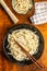 Cooked udon noodles. Traditional Japanese noodles