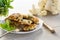 cooked vegetarian fried cauliflower cutlets, in a plate .