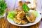 cooked vegetarian fried cauliflower cutlets, in a plate .