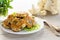 cooked vegetarian fried cauliflower cutlets, in a plate .