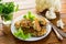 cooked vegetarian fried cauliflower cutlets, in a plate .