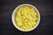 Cooked yellow rice in a bowl / rice turmeric food