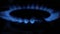 Cooker Stove Burner Image in Dark with Blue Flames Increasing from Small to Big