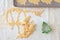 Cookie dough scraps, Christmas tree cookie cutter, pastry cloth, cookie sheet with cut out cookies