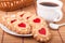 Cookie with heart jelly and cup of coffee bamboo napkin
