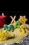 Cookie letters with cookie dough and a candle, word xmas with st