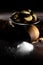 Cookies and barrel small with sugar on a dark wooden background