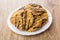 Cookies with chocolate, sesame, sunflower seeds in white plate