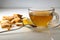 Cookies and a cup of tea on a saucer, on a white background. Light breakfast