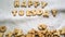 Cookies in the form of the alphabet prospect. Happy from homemade cookies on white background