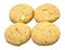 Cookies that are homemade using peanut powder, cashew nuts, wheat powder and butter on white background