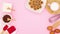 Cookies in plate and items for baking moving in corner of pink theme. Stop motion