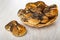 Cookies with poppy seeds in wicker basket, baranka on wooden table