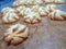 cookies in the shape of a brown background with deliciously baked edges