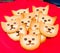 Cookies in the shape of a cat`s head in a plate