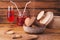 Cookies in the shape of a heart, cherry juice, wooden background in country style,