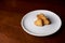 Cookies in the shape of hearts lying on a saucer