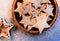 Cookies in a shape of a star in a wooden bowl