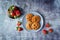 Cookies with strawberry filling in the plate. Spanish pastry