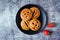 Cookies with strawberry filling in the plate. Spanish pastry