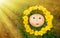 Cookies with symbol smiles on the background of green grass in wreath of dandelions in the sunlight. The horizontal